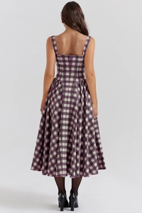 Detailed back view of a high-waisted plaid maxi dress with invisible zipper detail