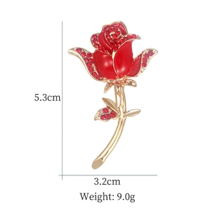 Detail showing dimensions of red enamel rose brooch with rhinestones: 5.3cm by 3.2cm