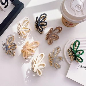 Eight-piece set of elegant hollow butterfly hair claws in various acetate colors and finishes