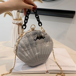 Grey marble texture shell-shaped handbag with thick black chain and gold shoulder strap