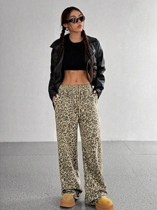 Classic leopard print wide-leg pants for women featuring a high-waisted elastic drawstring fit