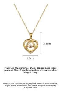 Detailed view of gold heart pendant with micro-inlaid cubic zirconia on titanium chain