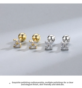 Macro detail of S925 sterling silver clover earrings with sparkling zircon and screw back