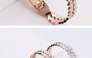 Macro detail of geometric pavé zircon bracelet with rose gold plating and spring clasp
