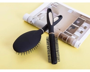 Set di spazzole per capelli nero opaco e oro con spazzola piatta e spazzola cilindrica