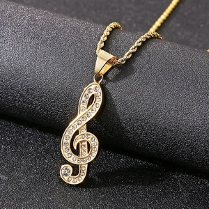 Iced out gold music note treble clef pendant necklace with sparkling stones for men