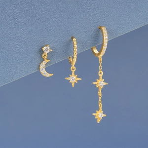 Close-up of S925 sterling silver moon and star hoop earrings set with zircon stones
