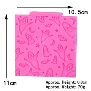 Pink Halloween silicone mold with ghost, bat, and pumpkin relief for cake decoration
