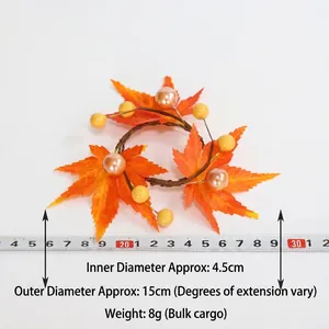 Fall maple leaf napkin ring and candle wreath with orange berries measuring 15cm wide