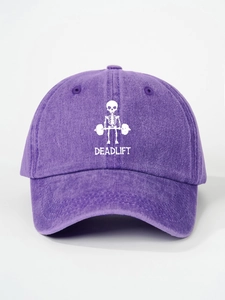 Detailed close-up of purple washed cotton baseball cap with white Deadlift skull print