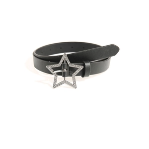 Close-up of black leather belt featuring a sparkling rhinestone star metal buckle detail
