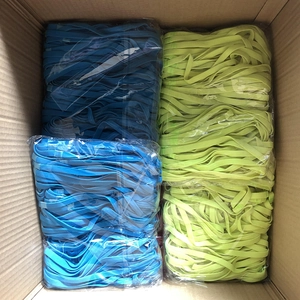 Bulk packaging of non-slip candy colored silicone elastic sports headbands in carton