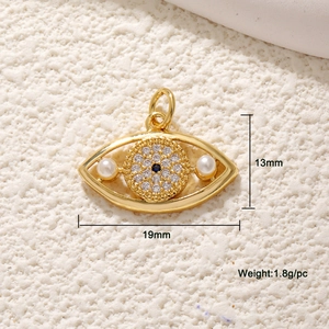 Golden Evil Eye pendant with blue zircon and white pearls, sized 13mm by 19mm