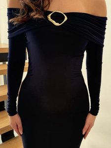 Detail of elegant navy long sleeve dress featuring a gold irregular ring metal buckle