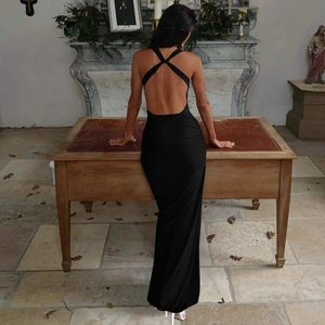 Elegant black backless maxi dress with cross strap design and silky slim fit fabric