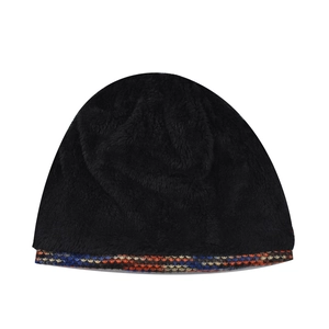 Close-up of warm winter beanie featuring soft fleece lining and colorful ethnic patterns