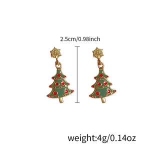 Pink Christmas tree star earrings with green enamel, red dots and sparkling rhinestones