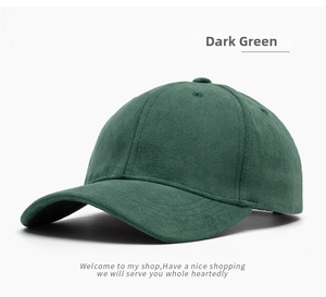 Detailed close-up of a classic dark green suede baseball cap with six-panel construction