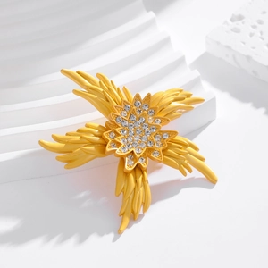 Elegant starfish sunflower brooch with yellow petals and cubic zirconia center for suits