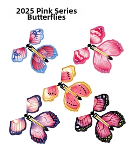 Close-up of five colorful wind-up flying butterfly toys with vibrant patterned wings