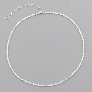 Detail of silver zircon necklace with sparkling crystals and adjustable lobster clasp