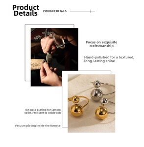 Detail of 18K gold plated spherical ring showing hand-polished texture and vacuum plating