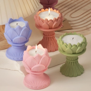 Detailed lotus candle holders in pastel colors with elegant burnt wax effect