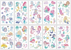 Flat lay of 10 glitter mermaid temporary tattoo sheets for kids with colorful cartoon patterns