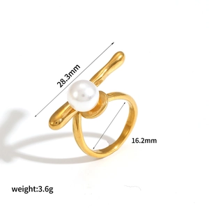 Detailed view of gold stainless steel ring with white pearl, 16.2mm inner diameter