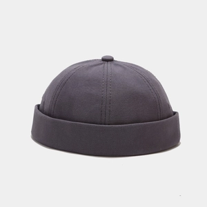 Detailed view of a dark grey cotton miki hat showing twill texture and retro brim design