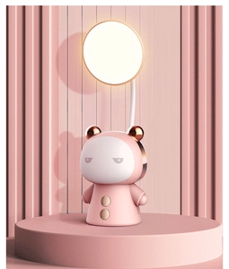 Close-up of pink bear cartoon LED desk lamp with flexible neck and circular light head
