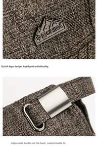 Detail of mountain metal logo and adjustable silver buckle on a textured baseball cap