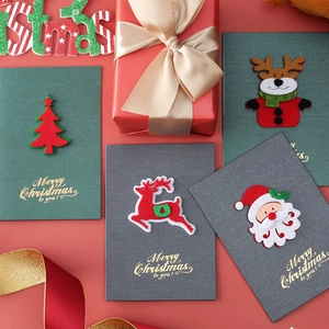 Set of four 3D felt Christmas cards with reindeer designs and matching envelopes