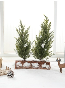 Miniature double snow-covered pine trees on a natural wood base for desk decoration