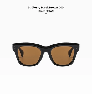 Detailed front view of square sunglasses with black frame and brown lenses and silver rivets