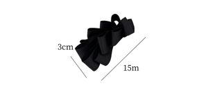 Detail view of 3cm wide black satin bow hair clip with size dimensions on white background