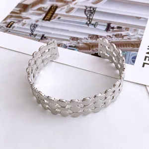 Modern silver three-layer hollowed-out oval open bangle bracelet with polished finish