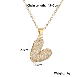 Detail showing 45+5cm chain length and 2.6cm by 1.7cm size of the heart pendant