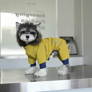 Waterproof yellow pet raincoat with blue cuffs and outdoor logo for small dogs