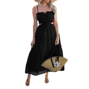 Elegant black bohemian maxi dress with waist cutout and pleated skirt for summer beach vacation
