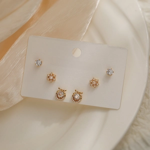 Exquisite 18K gold-plated earring set with 3 pairs of white zircon studs and drops