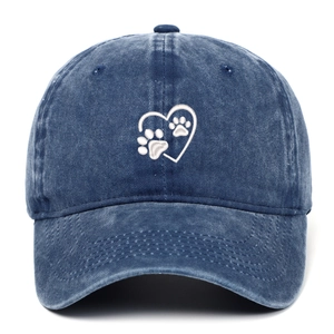 Washed navy denim baseball cap with white heart and paw print embroidery on front