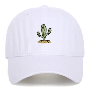 Close-up of green cactus embroidery on a white vintage washed cotton baseball cap