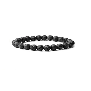 Detailed close-up of natural black lava stone beads on an elastic crystal bracelet