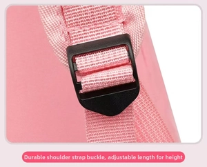 Adjustable shoulder strap with sturdy black plastic buckle on pink ballet backpack