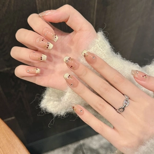 Handmade gradient cat-eye press-on nails with cherry designs and gold glitter tips