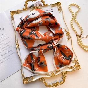 Elegant orange floral silk skinny scarf with large white flower prints for hair or neck