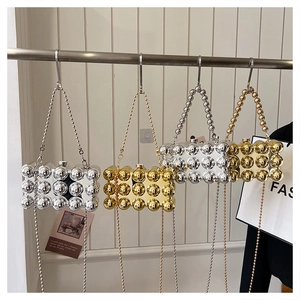 Chic metallic ball evening handbags in gold and silver finish with beaded chain straps