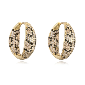 Luxury gold hoop earrings with leopard pattern pavé zircon stones in a professional shot