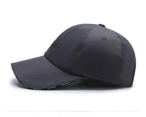 Side view of dark gray breathable quick-dry sports cap with SPORTS text detail